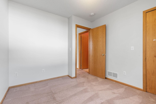 10779 57th St NE, Albertville, MN 55301 - spare room featuring carpet floors and a smoke detector