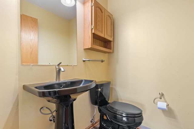 10779 57th St NE, Albertville, MN 55301 - half bathroom featuring toilet and baseboards