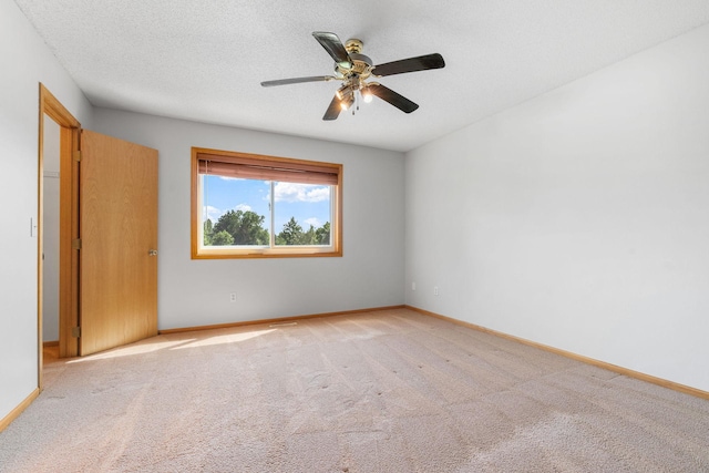 10779 57th St NE, Albertville, MN 55301 - unfurnished bedroom featuring light colored carpet and a ceiling fan
