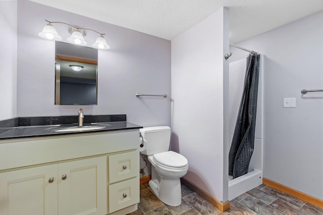 10779 57th St NE, Albertville, MN 55301 - bathroom featuring vanity, a shower stall, and stone finish flooring