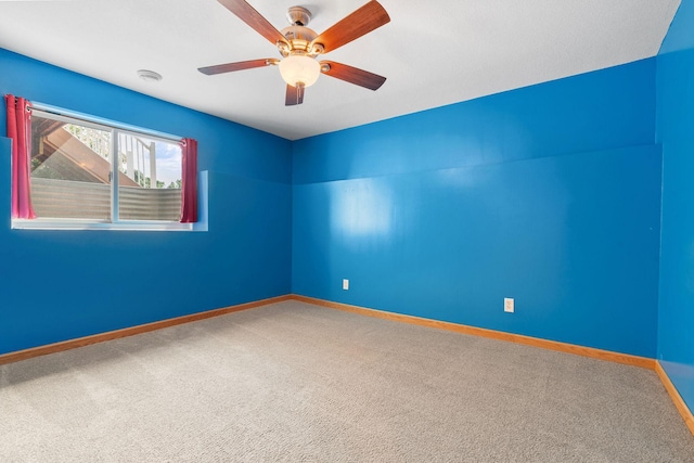 10779 57th St NE, Albertville, MN 55301 - carpeted empty room featuring ceiling fan and a smoke detector