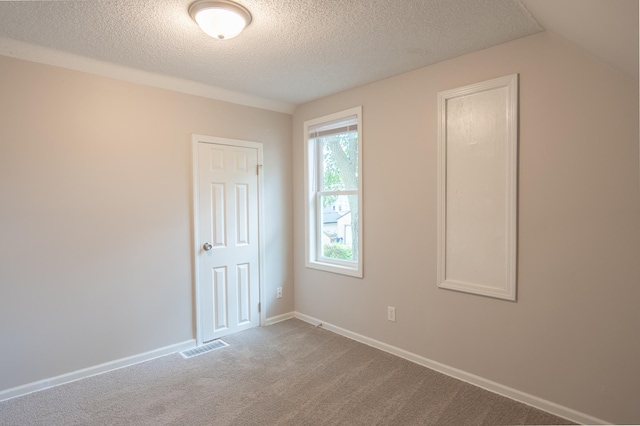 922 Minnehaha Ave E, Saint Paul, MN 55106 - unfurnished bedroom with a textured ceiling, carpet flooring, and baseboards