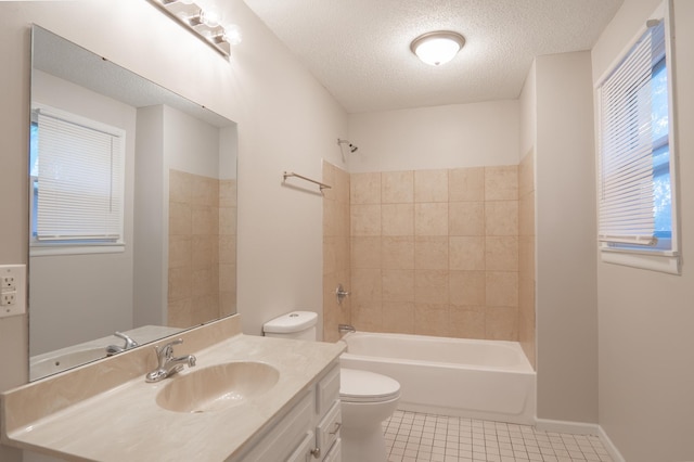 922 Minnehaha Ave E, Saint Paul, MN 55106 - bathroom with toilet, vanity, tile patterned flooring, a textured ceiling, and shower / tub combination