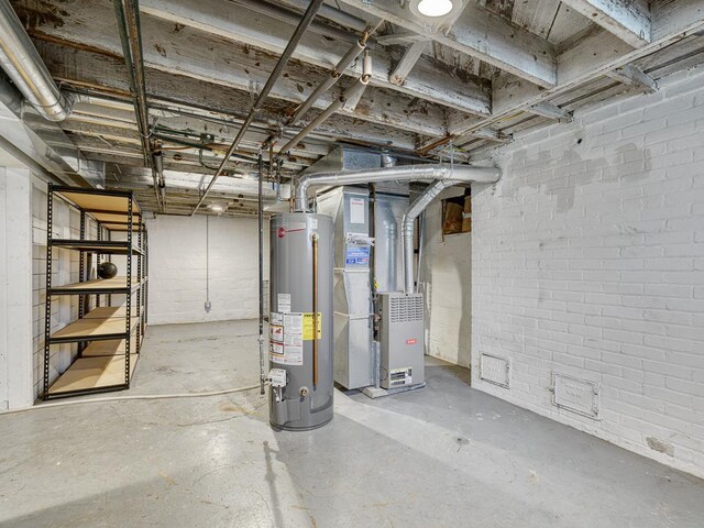 1715 Bush Ave, Saint Paul, MN 55106 - unfinished below grade area featuring water heater and heating unit