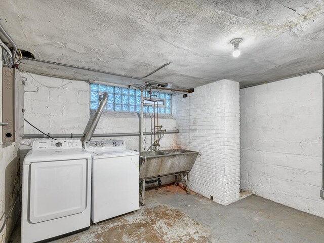 1715 Bush Ave, Saint Paul, MN 55106 - basement featuring separate washer and dryer and a sink