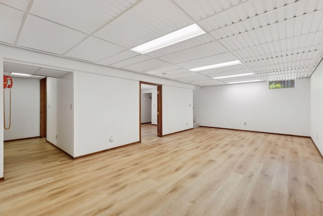 11124 Welcome Ave N, Champlin, MN 55316 - unfurnished room with light wood-style floors and baseboards