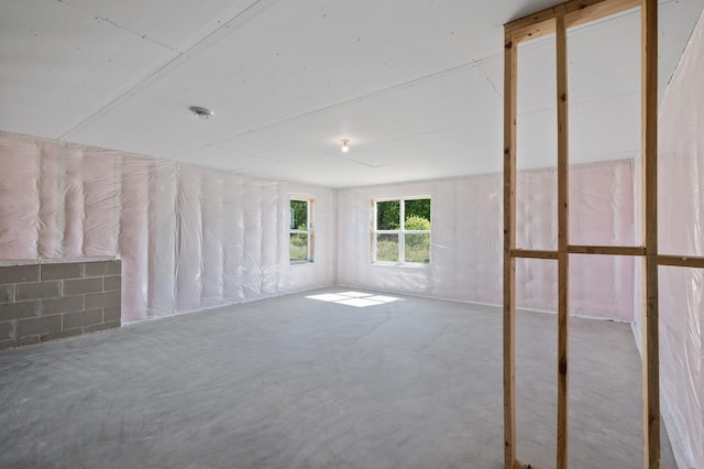 2520 230th Ct NW, Saint Francis, MN 55070 - spare room featuring concrete floors and concrete block wall