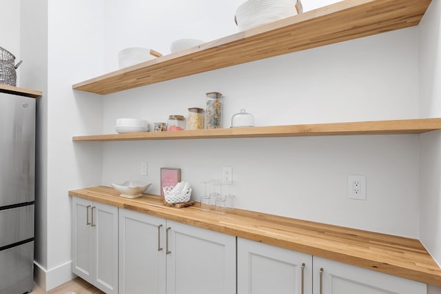 2520 230th Ct NW, Saint Francis, MN 55070 - bar featuring freestanding refrigerator and light wood-style flooring