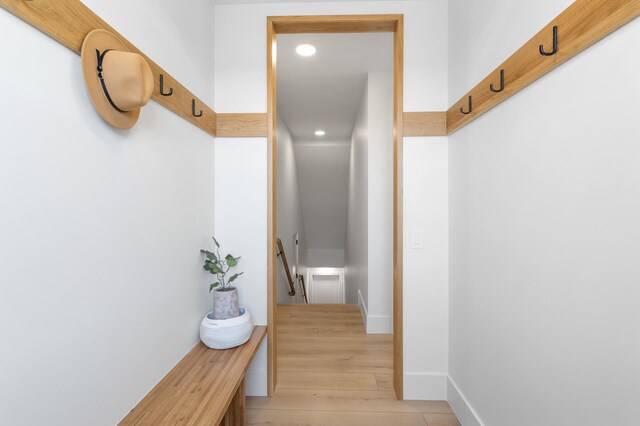 2520 230th Ct NW, Saint Francis, MN 55070 - hall featuring an upstairs landing, recessed lighting, light wood-style flooring, and baseboards