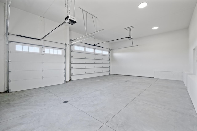 2520 230th Ct NW, Saint Francis, MN 55070 - garage featuring a garage door opener and recessed lighting