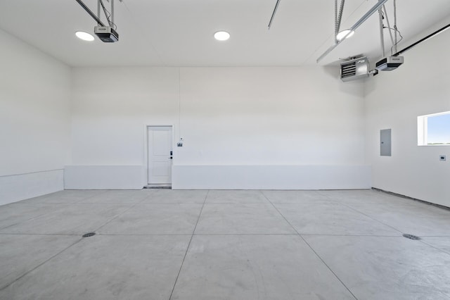 2520 230th Ct NW, Saint Francis, MN 55070 - garage with electric panel and a garage door opener