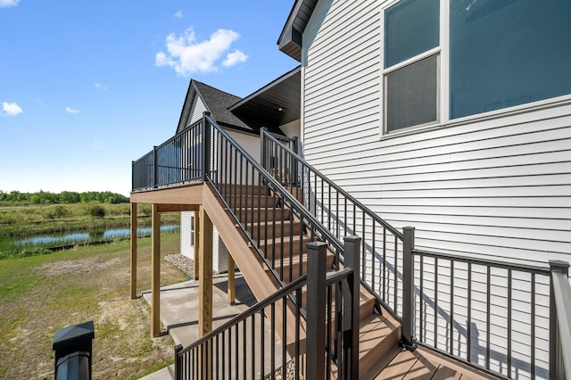 2520 230th Ct NW, Saint Francis, MN 55070 - wooden deck with stairway and a water view