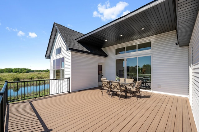 2520 230th Ct NW, Saint Francis, MN 55070 - wooden terrace featuring outdoor dining area and a water view