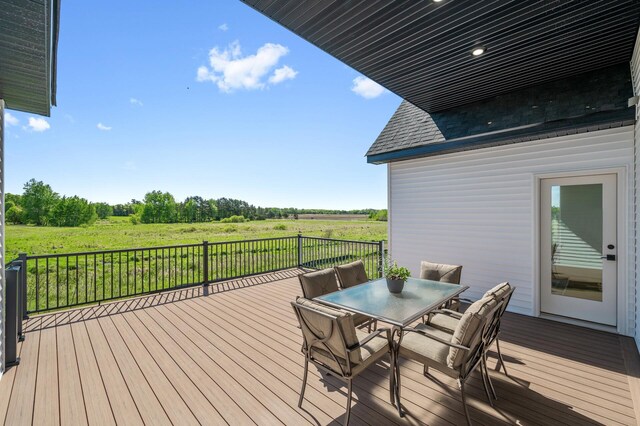 2520 230th Ct NW, Saint Francis, MN 55070 - wooden terrace with outdoor dining area and a view of rural / pastoral area