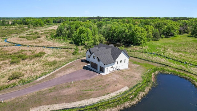 2520 230th Ct NW, Saint Francis, MN 55070 - aerial view of property and surrounding area with a heavily wooded area and a nearby body of water