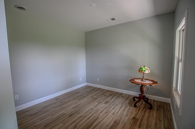 850 60th Ave SW, Benson, MN 56231 - unfurnished room featuring wood finished floors and baseboards