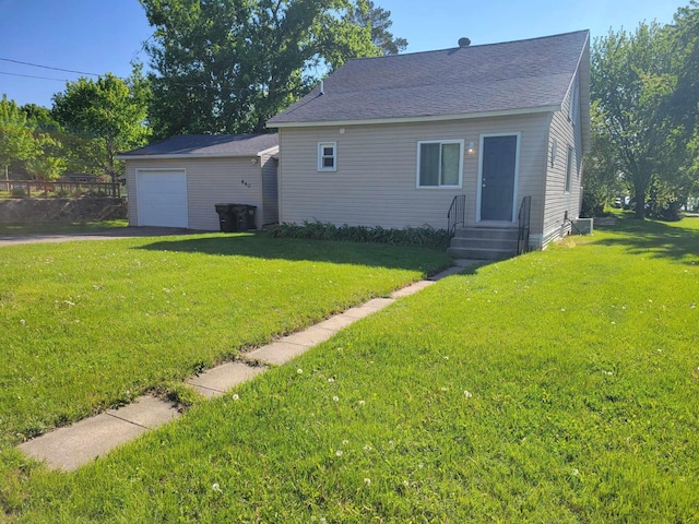 640 6th St, Albany, MN 56307 - view of front facade with a front lawn, driveway, a garage, and roof with shingles