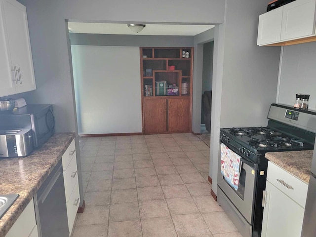 640 6th St, Albany, MN 56307 - kitchen with appliances with stainless steel finishes, built in features, white cabinetry, and a sink