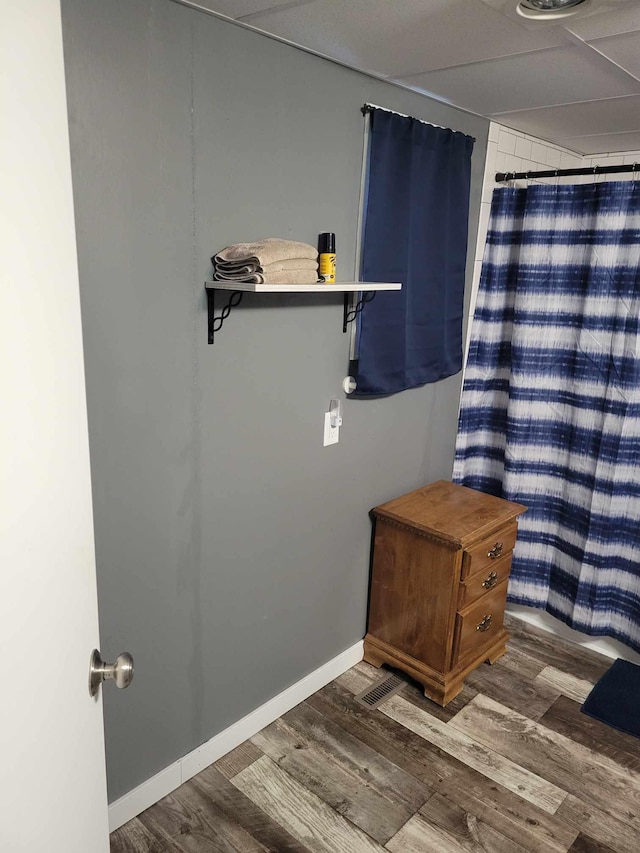 640 6th St, Albany, MN 56307 - full bathroom featuring wood finished floors and a shower with curtain
