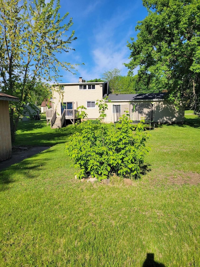 640 6th St, Albany, MN 56307 - view of grassy yard with a deck