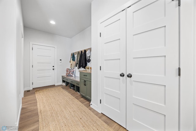 2652 70th Ave S, Fargo, ND 58104 - mudroom featuring light wood-style floors, baseboards, and recessed lighting