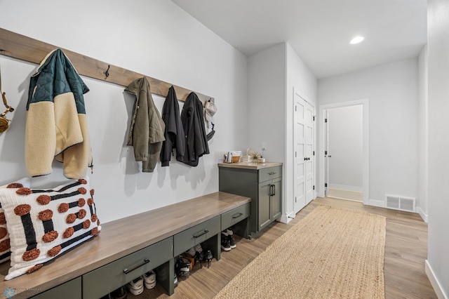 2652 70th Ave S, Fargo, ND 58104 - mudroom with light wood-style floors, baseboards, and recessed lighting