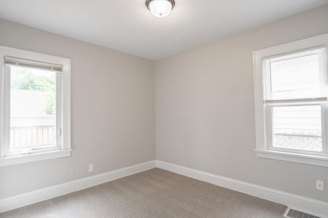 3550 Bryant Ave N, Minneapolis, MN 55412 - empty room featuring carpet flooring and baseboards
