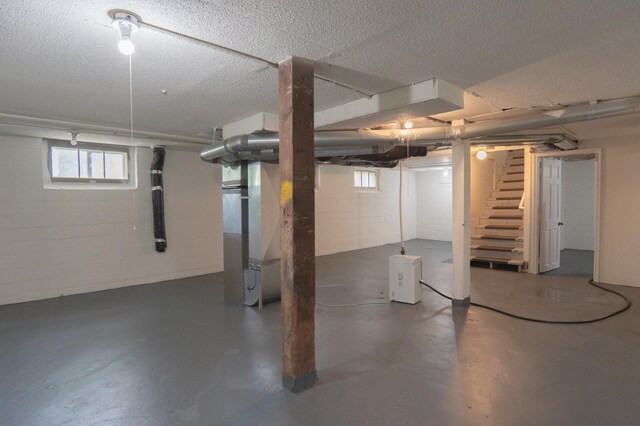 3550 Bryant Ave N, Minneapolis, MN 55412 - below grade area featuring stairway and heating unit