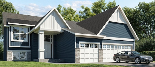1949 Lusitano St, Shakopee, MN 55379 - view of front of property featuring driveway, a garage, stone siding, and board and batten siding