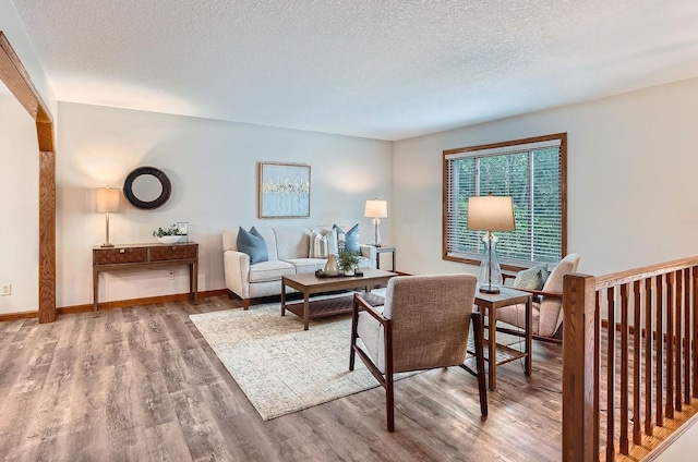 4900 Hodgson Rd, Connection, Shoreview, MN 55126 - living area with wood finished floors and a textured ceiling