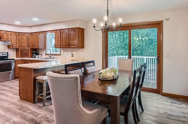 4900 Hodgson Rd, Connection, Shoreview, MN 55126 - dining area featuring light wood-style flooring, a chandelier, and recessed lighting