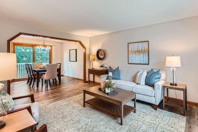 4900 Hodgson Rd, Connection, Shoreview, MN 55126 - living area with wood finished floors and a chandelier