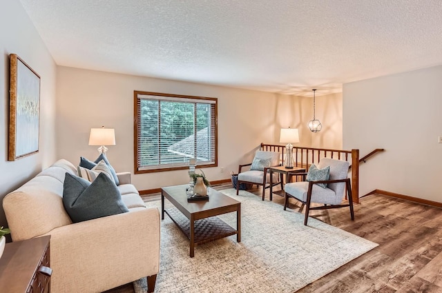 4900 Hodgson Rd, Connection, Shoreview, MN 55126 - living room featuring wood finished floors and a textured ceiling