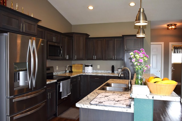2008 Whiting Rd NW Unit 10, Bemidji, MN 56601 - kitchen featuring appliances with stainless steel finishes, a sink, dark brown cabinets, recessed lighting, and an island with sink