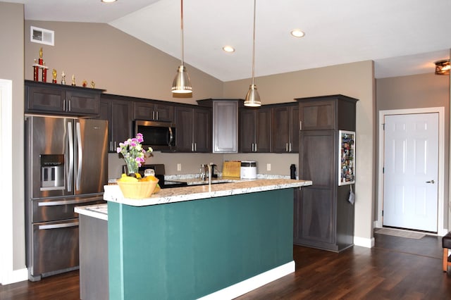 2008 Whiting Rd NW Unit 10, Bemidji, MN 56601 - kitchen featuring stainless steel appliances, dark brown cabinets, lofted ceiling, a center island with sink, and dark wood-type flooring