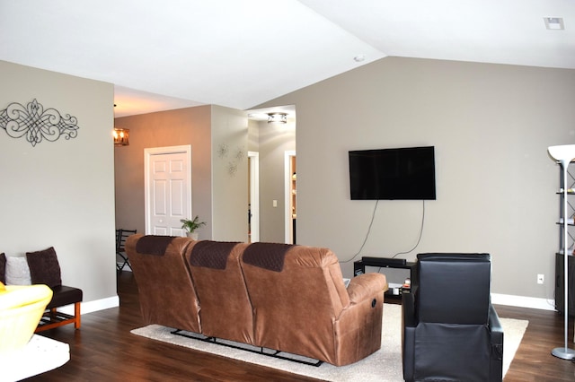2008 Whiting Rd NW Unit 10, Bemidji, MN 56601 - living room featuring vaulted ceiling, wood finished floors, baseboards, and a chandelier