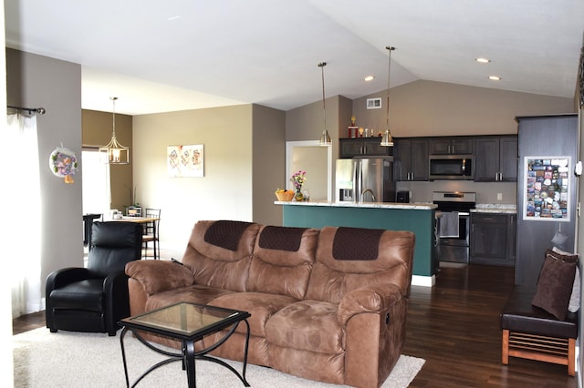 2008 Whiting Rd NW Unit 10, Bemidji, MN 56601 - living area featuring lofted ceiling, dark wood finished floors, and recessed lighting