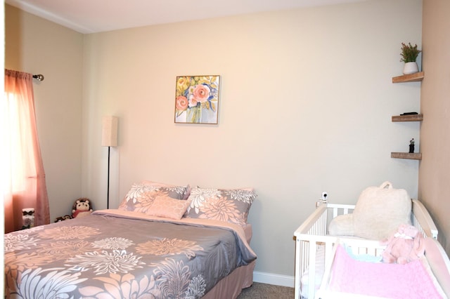2008 Whiting Rd NW Unit 10, Bemidji, MN 56601 - bedroom with carpet floors and baseboards