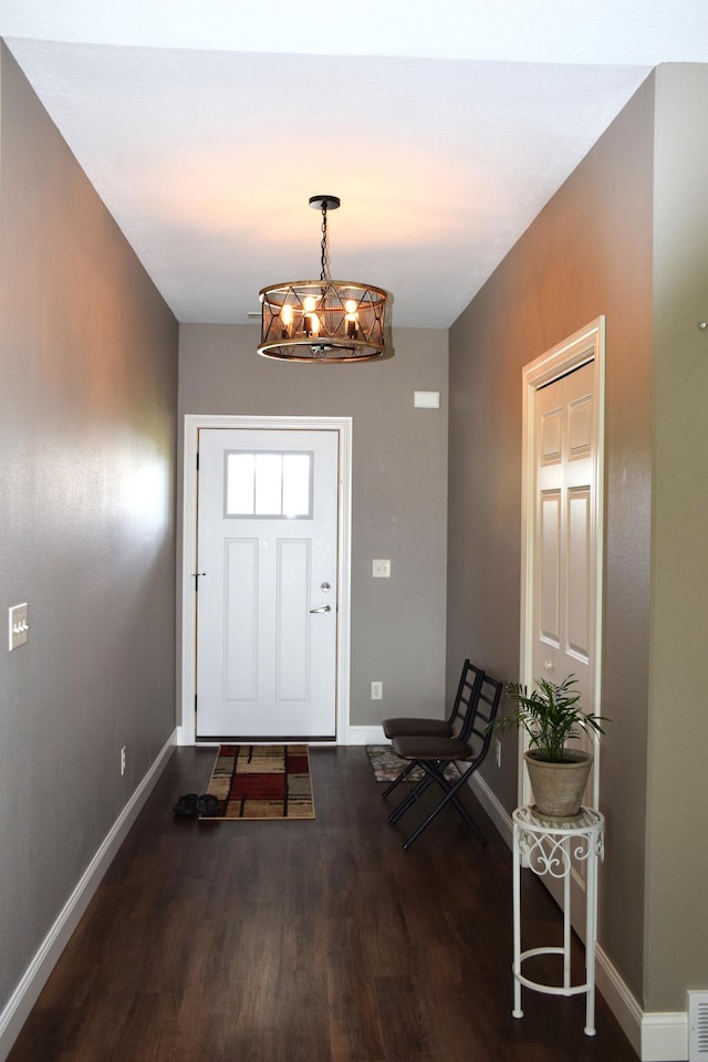 2008 Whiting Rd NW Unit 10, Bemidji, MN 56601 - entrance foyer with baseboards, wood finished floors, and a chandelier