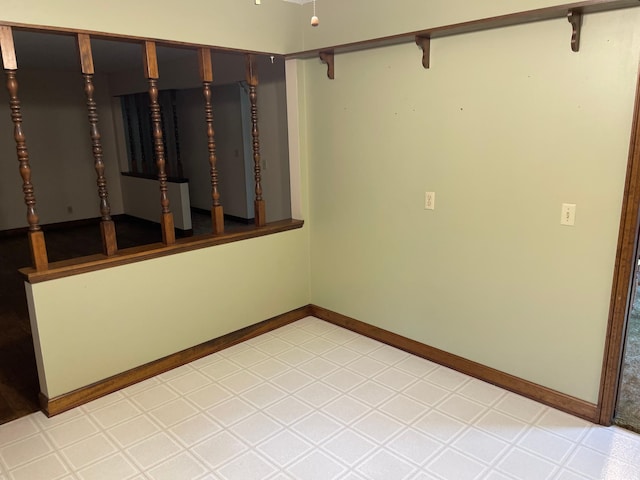 7765 Woodpark Blvd, Woodbury, MN 55125 - unfurnished room with baseboards and light floors