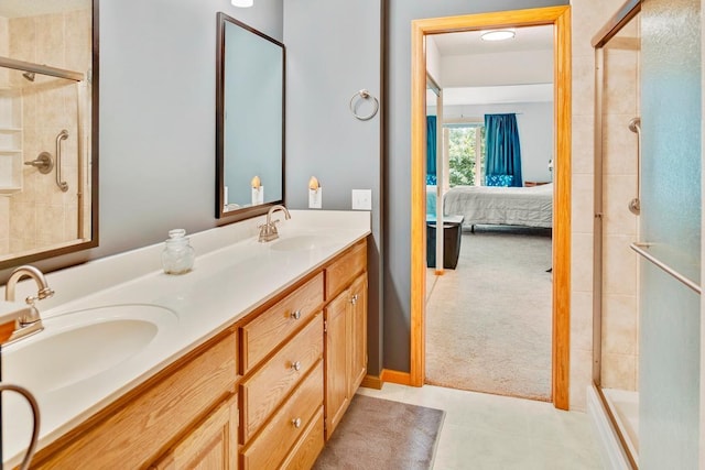 1439 Summit Shores Dr, Burnsville, MN 55306 - ensuite bathroom featuring a stall shower, double vanity, and tile patterned flooring
