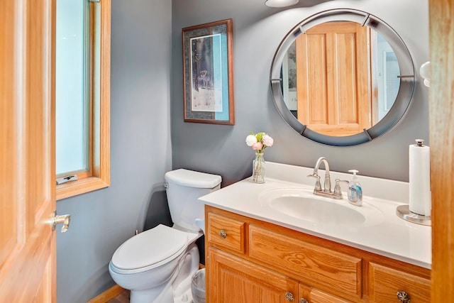 1439 Summit Shores Dr, Burnsville, MN 55306 - bathroom featuring vanity and toilet