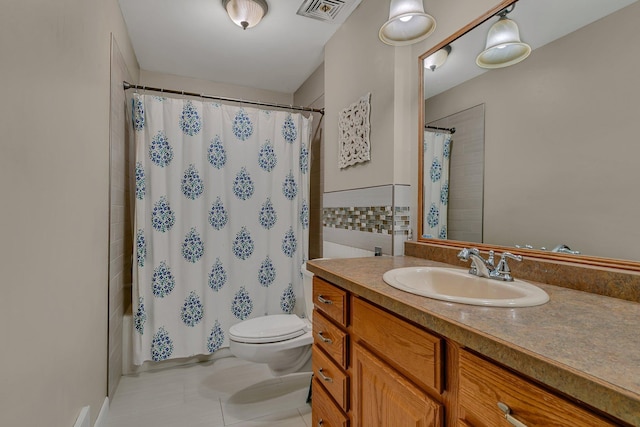 303 Park Ave SE, Pierz, MN 56364 - bathroom featuring vanity, toilet, tile patterned flooring, and shower / bathtub combination with curtain