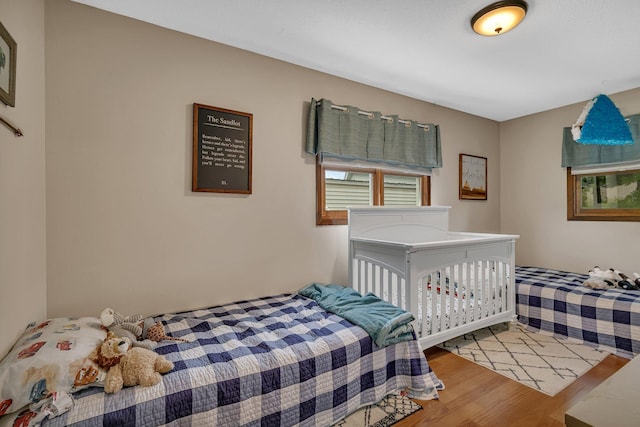 303 Park Ave SE, Pierz, MN 56364 - bedroom with wood finished floors