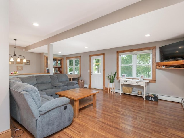 306 Benton St W, Cologne, MN 55322 - living area featuring light wood-style floors, recessed lighting, a baseboard radiator, and baseboards