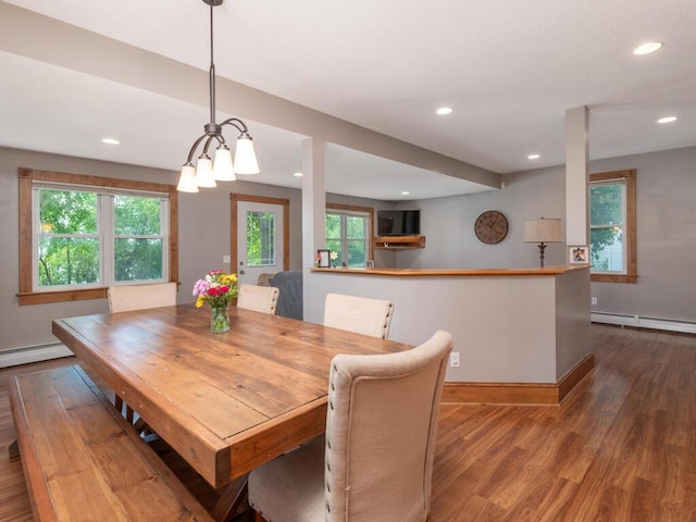 306 Benton St W, Cologne, MN 55322 - dining room featuring wood finished floors, baseboards, recessed lighting, and baseboard heating