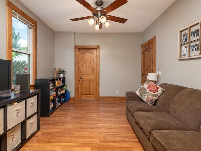 306 Benton St W, Cologne, MN 55322 - living room featuring light wood-style flooring and a ceiling fan