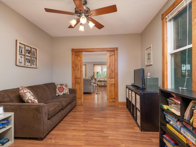306 Benton St W, Cologne, MN 55322 - living area with light wood-style floors and a ceiling fan