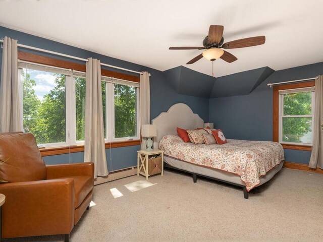 306 Benton St W, Cologne, MN 55322 - carpeted bedroom with a baseboard radiator, multiple windows, and ceiling fan