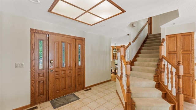 7420 Long Lake Rd, Dovre Twp, MN 56201 - entryway featuring baseboards, stairway, and light tile patterned floors